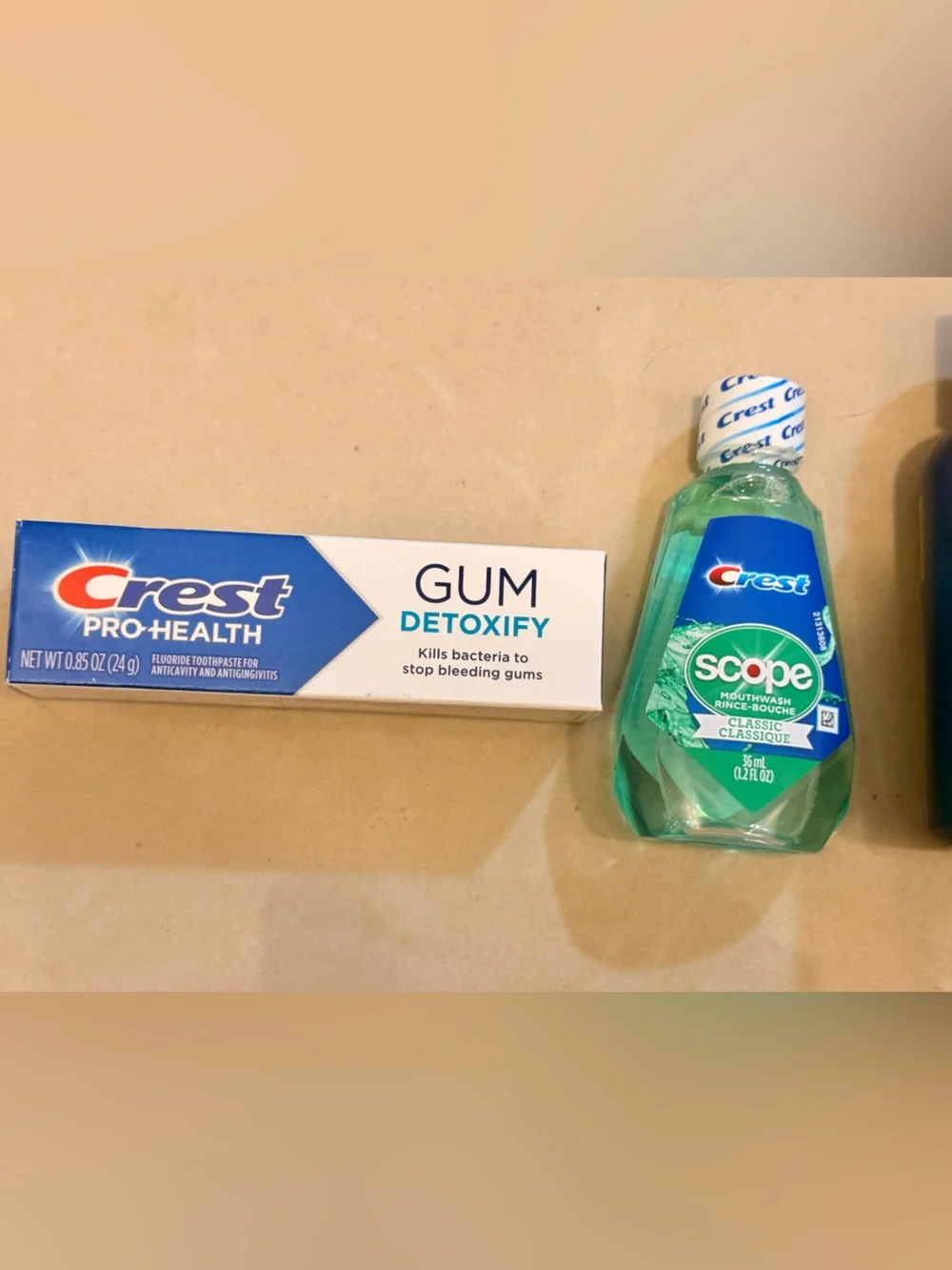 Travel size toothpaste, mouthwash, cerave hydrating cream and suave shampoo